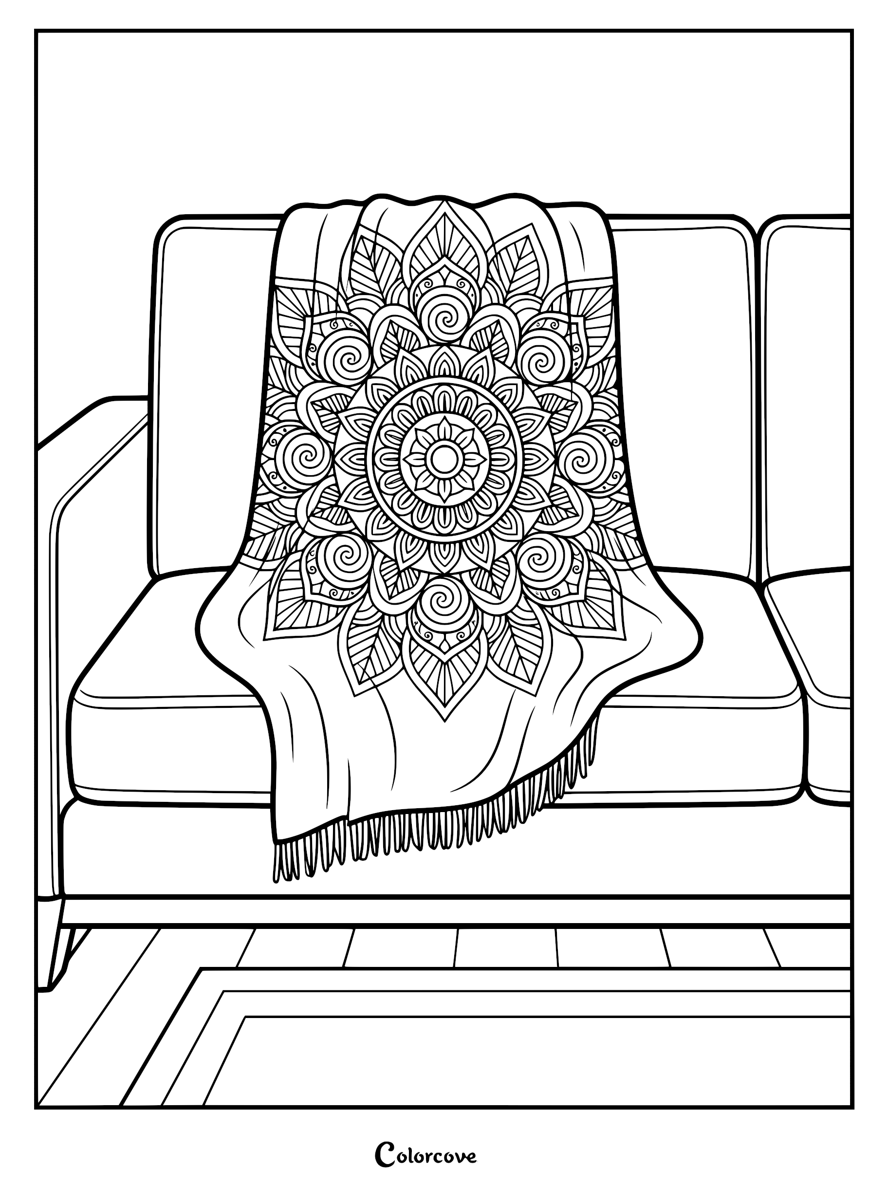 A coloring page featuring a comfortable sofa draped with a detailed mandala patterned throw blanket with fringe.